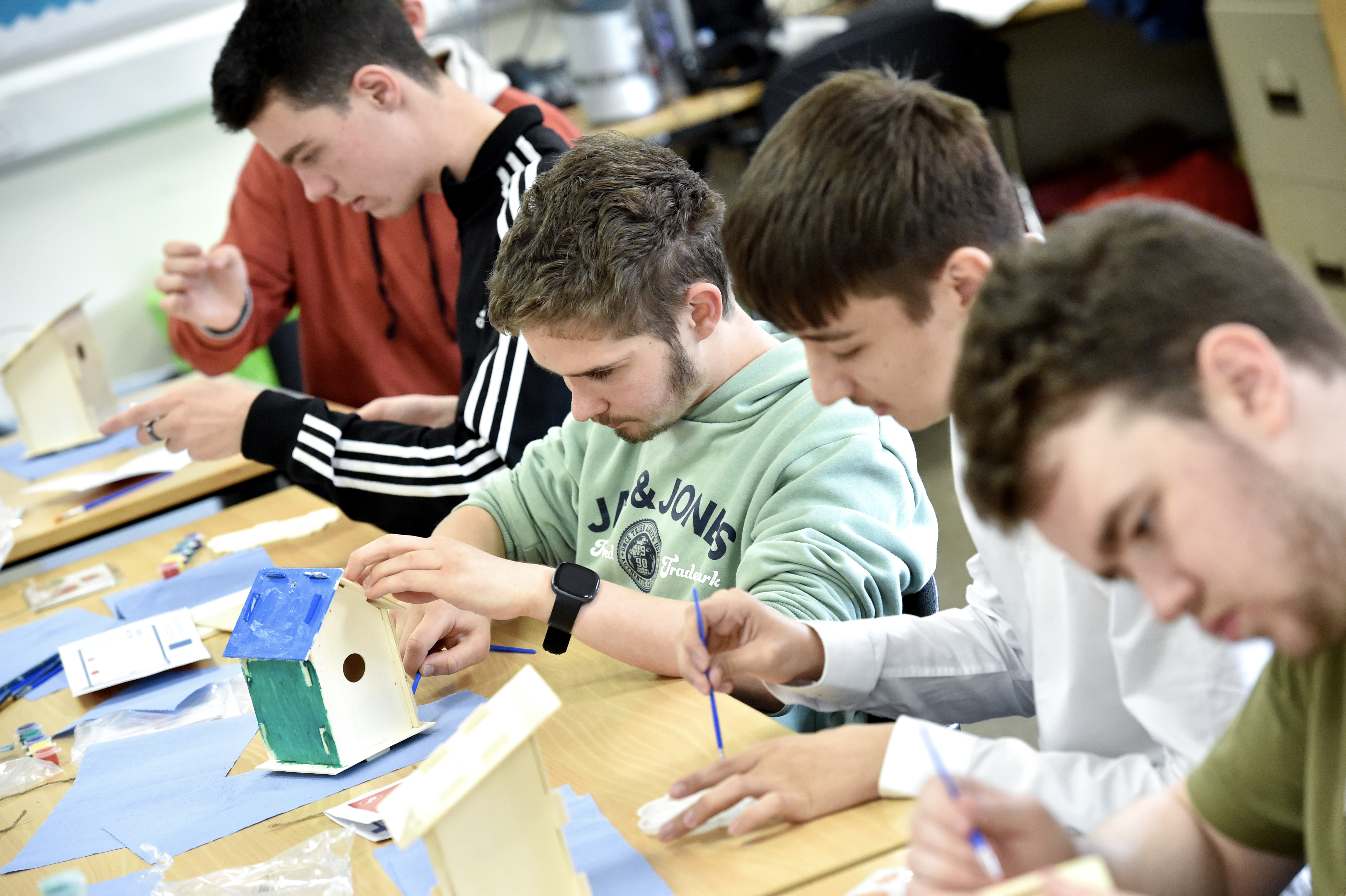 Group of young men working